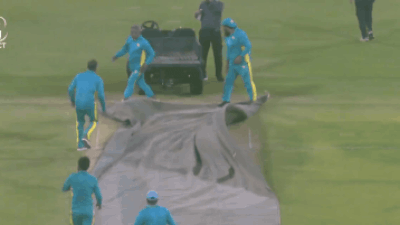 Chaos at Gaddafi Stadium: PSL ground staff slip, fall as covers fly in Lahore – Watch | Cricket News Chaos at Gaddafi Stadium: PSL ground staff slip, fall as covers fly in Lahore – Watch | Cricket News
