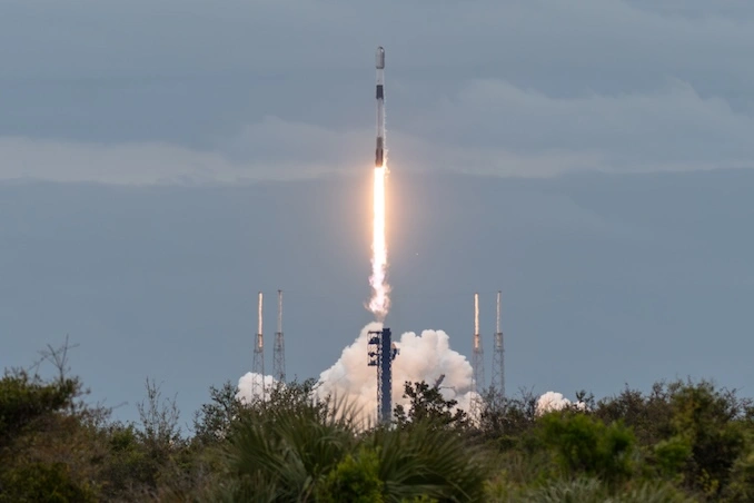 ocket launching into the sky during a SpaceX and NASA liftoff in Florida