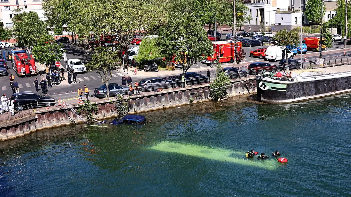 Trainee driver sends bus into River Seine near Paris: reports
