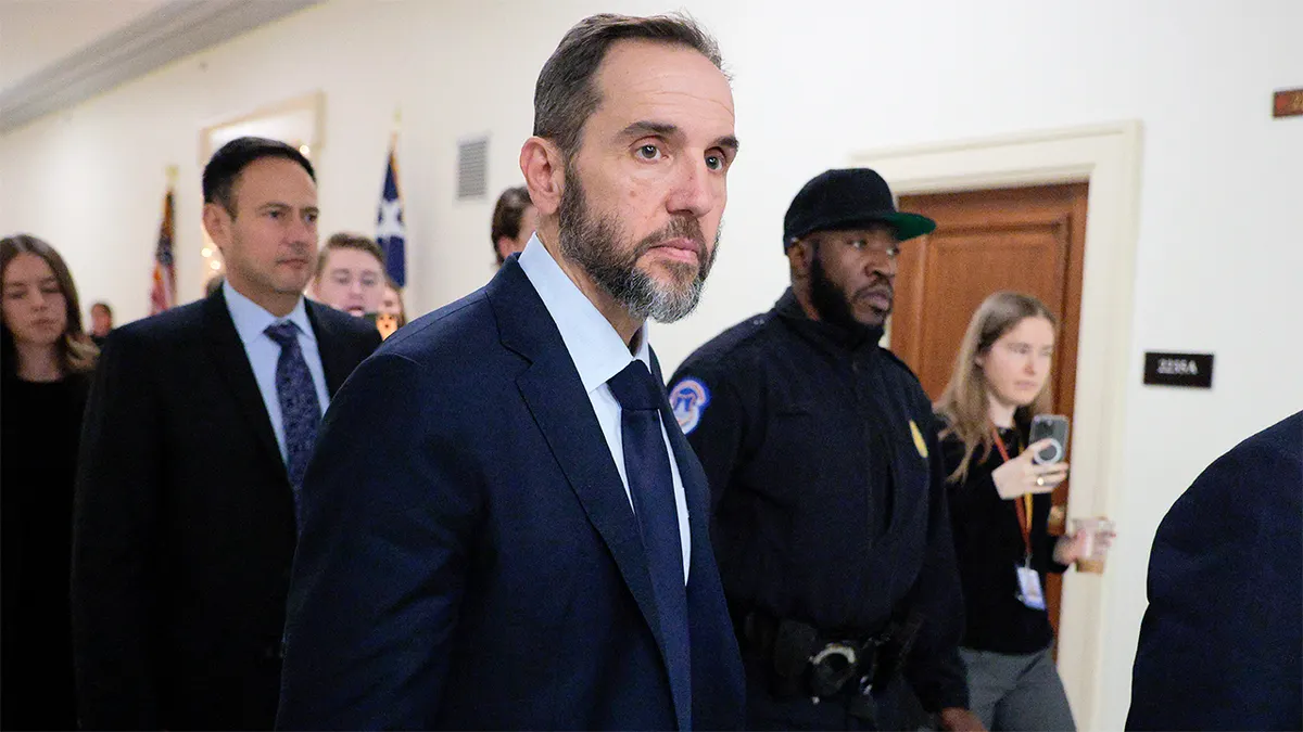 Former DOJ prosecutor charged with emailing Jack Smith report to herself Former DOJ prosecutor charged with emailing Jack Smith report to herself