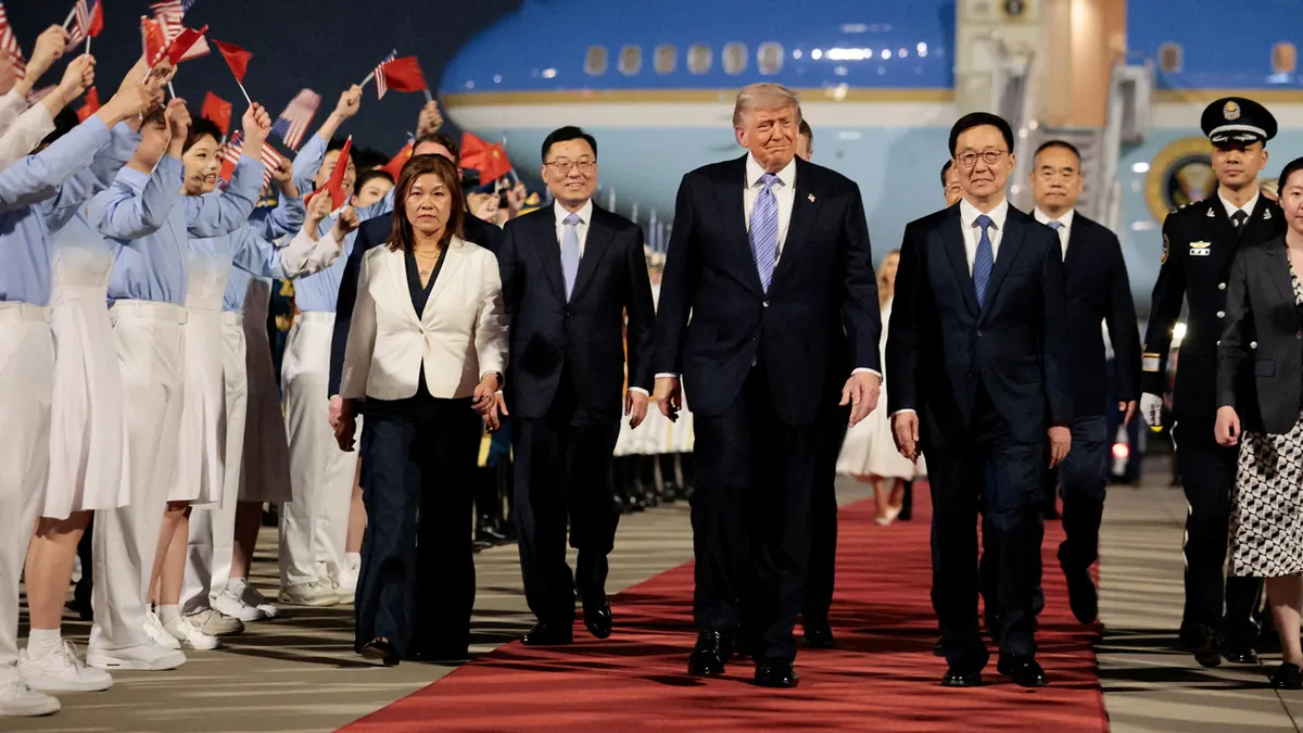 Trump arrives in Beijing for high-stakes trade talks with Xi Jinping
