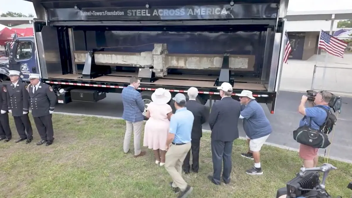 World Trade Center steel beam arrives at school where Bush learned of 9/11